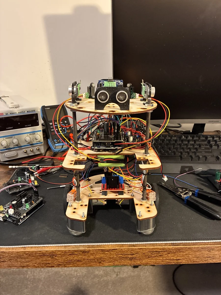 Physical robot assembly on the workbench.