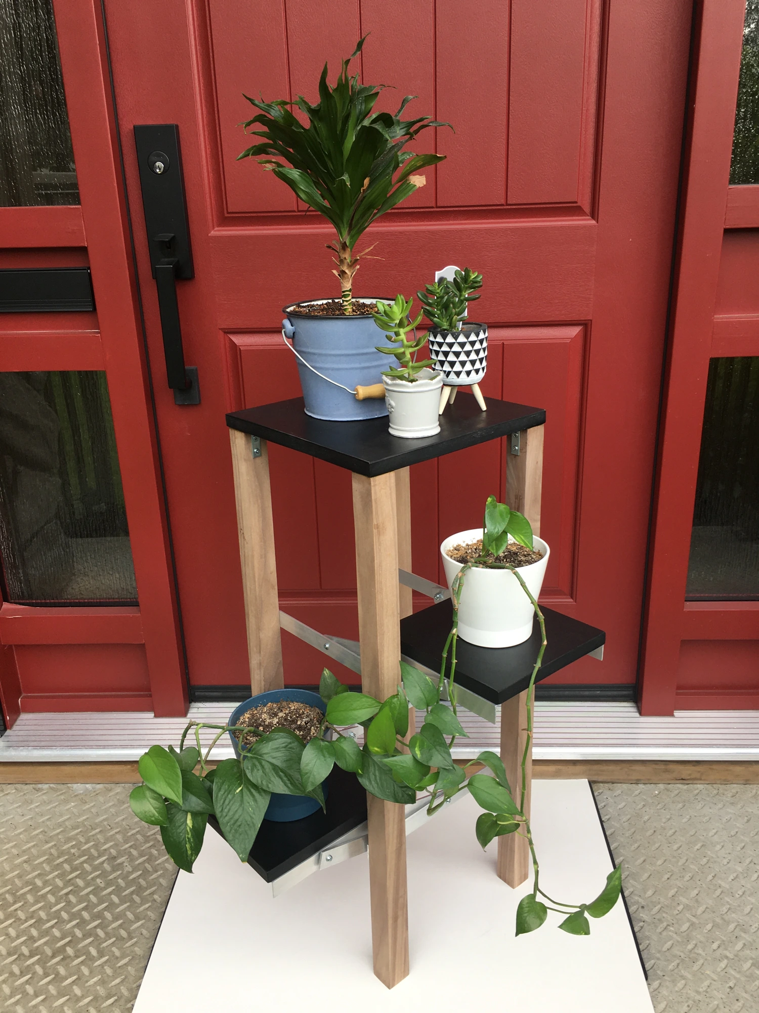 Plant stand with shelves extended